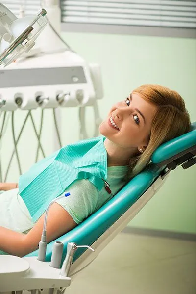 woman smiling during her visit to Gina Biedermann DDS in Keller, TX