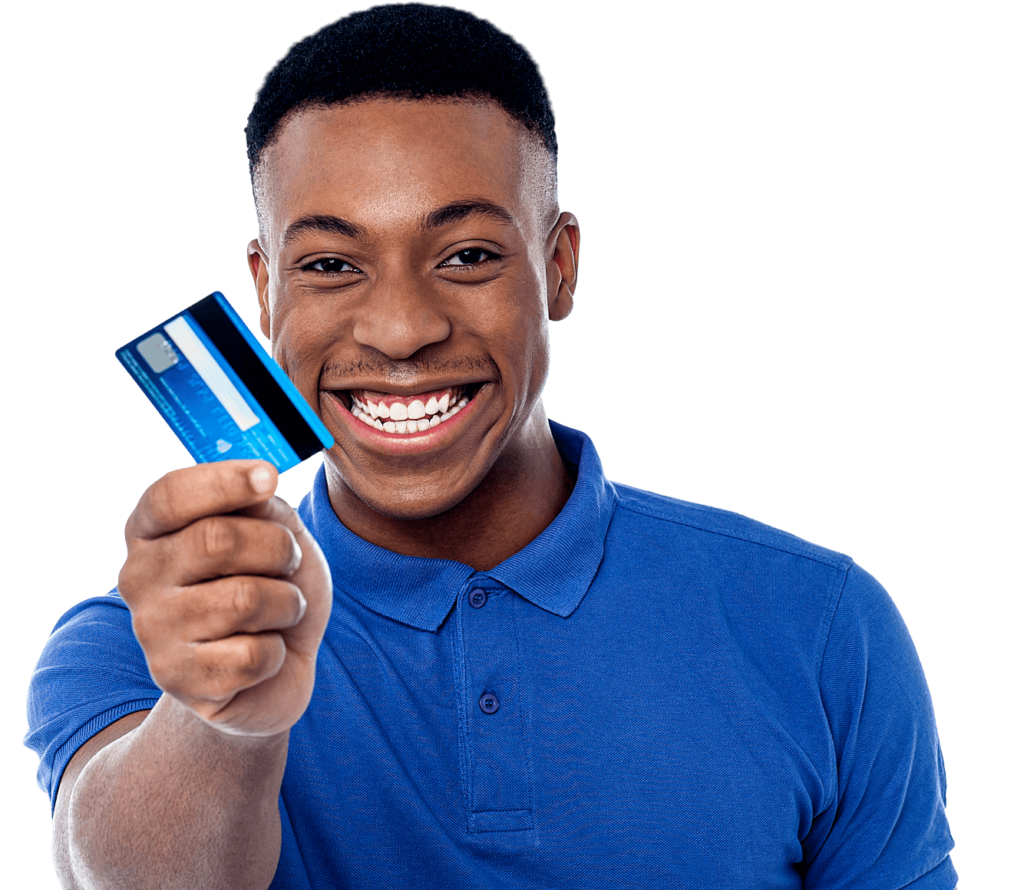 Happy man smiling while holding his credit card